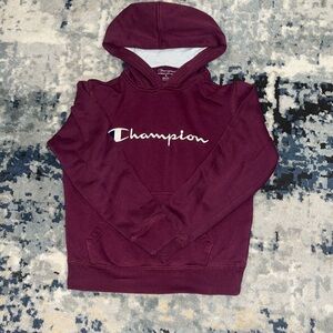 I'm selling a maroon champion sweatshirt in a kids M